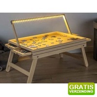 Bekijk de aanbieding van DealDonkey.com 2: Hi Puzzelplaat met opberglades - Incusief verlichting - 1.000 Stukjes